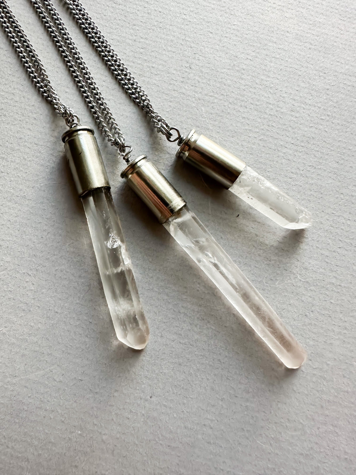 Light Against the Machine- Crystal bullet necklaces