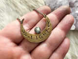 Brass and labradorite crescent moon necklace by Star Native