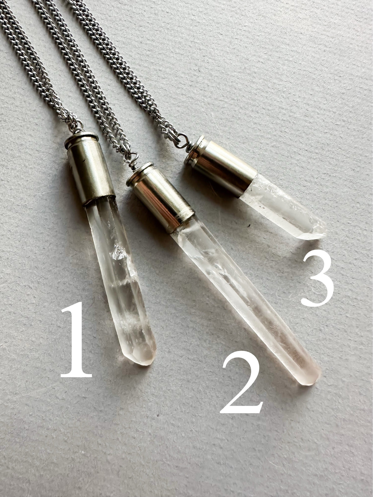 Light Against the Machine- Crystal bullet necklaces